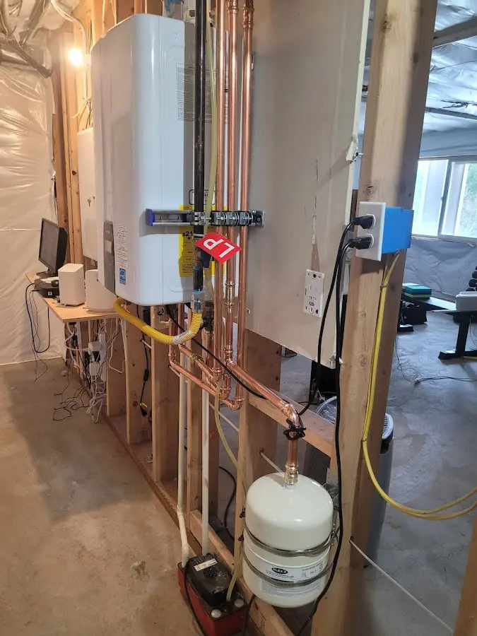 Licensed plumber repairing a kitchen sink in Casper